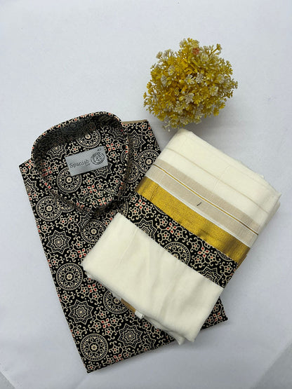 Black patterned shirt with white and gold folded fabric on a white background